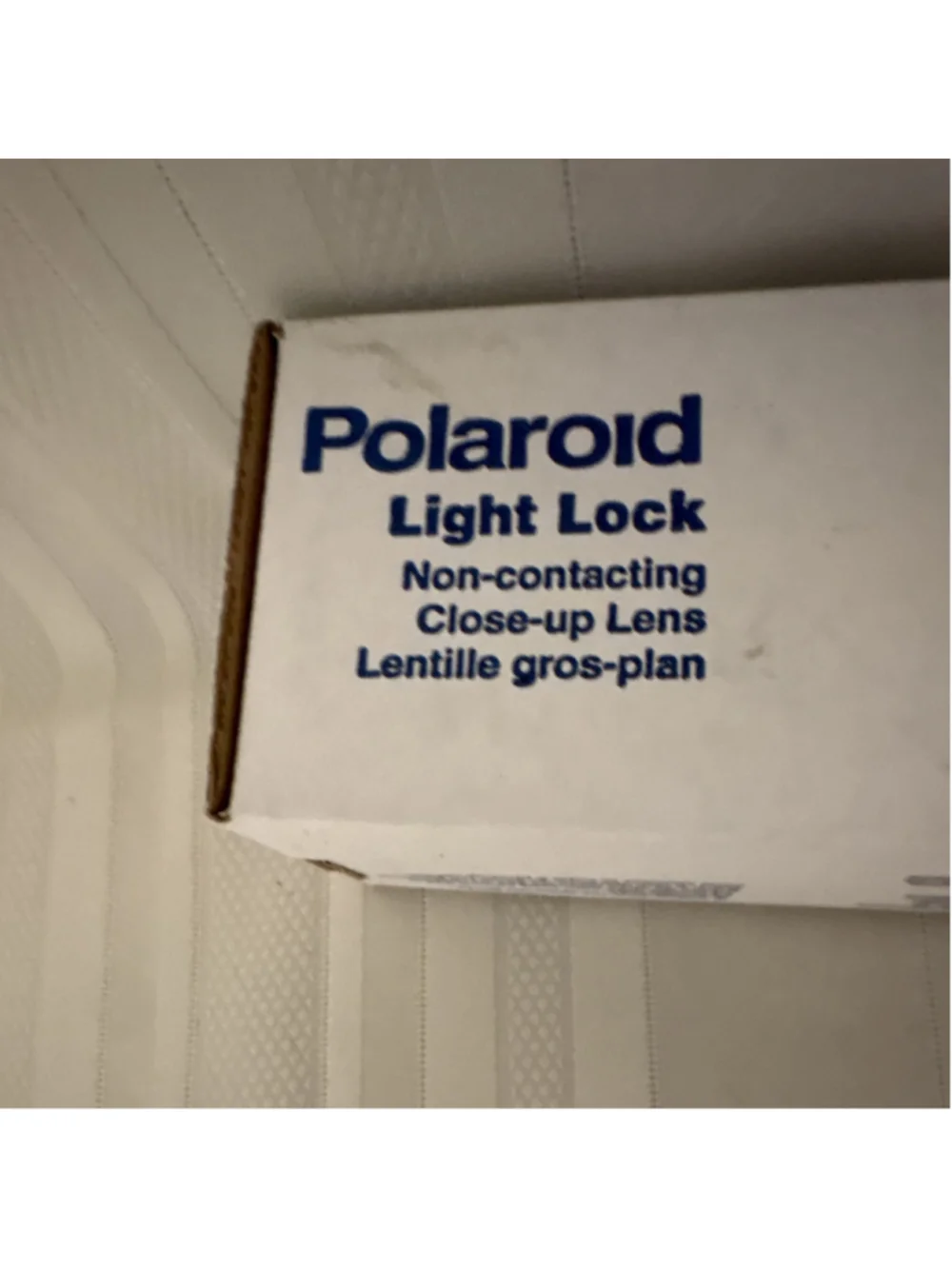 Polaroid light lock